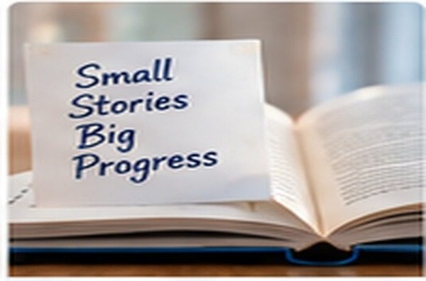 Small Stories, Big Progress notu bulunan açık bir kitap